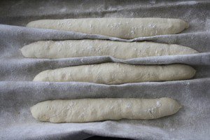 Proofing baguettes on a floured linen